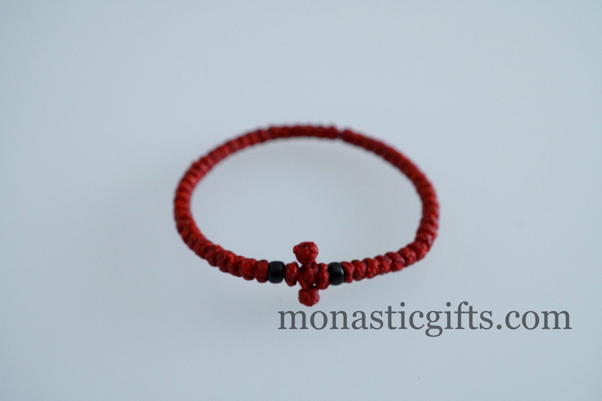 Adjustable waterproof Greek Orthodox waxed prayer bracelet komboskini with thin knots and beads.