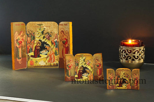 Byzantine wooden triptych icon of the Birth of Christ and Archangels with an Orthodox cross on the back.