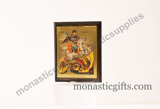 Handmade wooden Byzantine Orthodox icon refrigerator magnet of Saint George slaying the dragon.