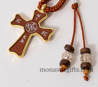 Christian keychain in the shape of a cross , embroidered fabric with the symbols of Jesus Christ ,a perfect Religious Gift .