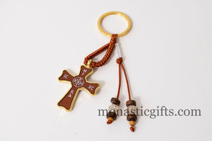 Christian keychain in the shape of a cross , embroidered fabric with the symbols of Jesus Christ ,a perfect Religious Gift .