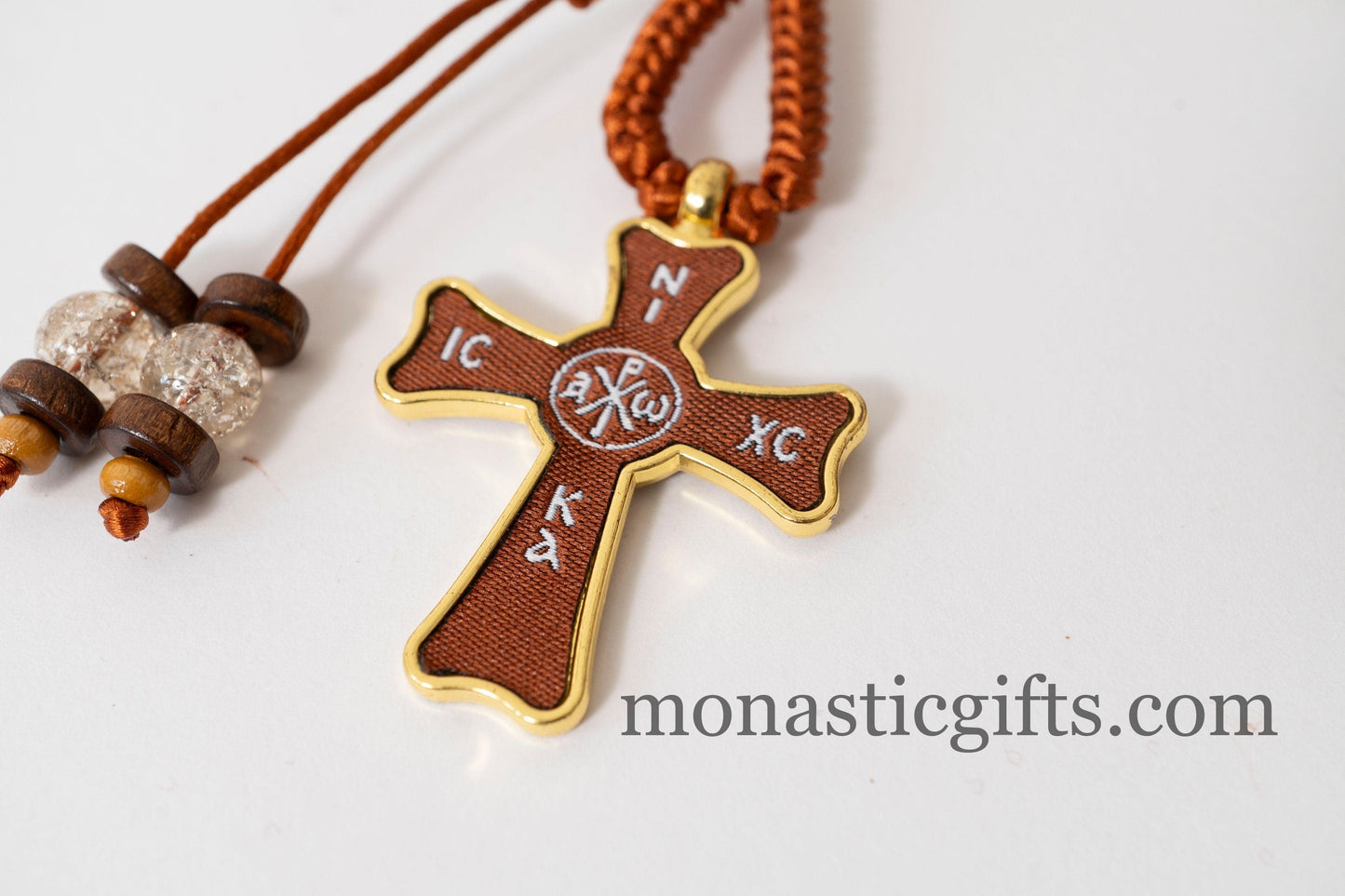 Christian keychain in the shape of a cross , embroidered fabric with the symbols of Jesus Christ ,a perfect Religious Gift .